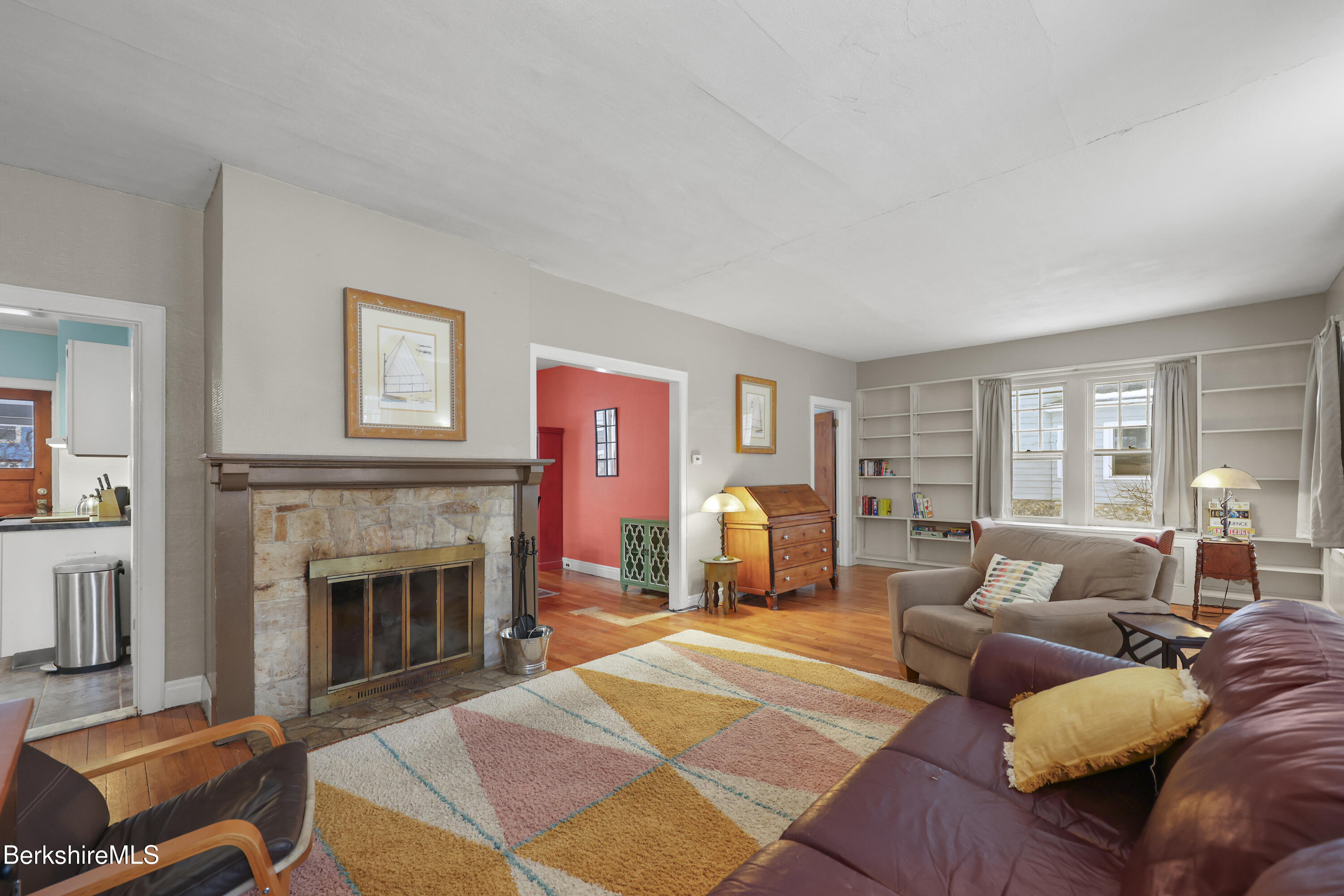 64 Notch Road North Adams, MA 01247 - Photo 8 of 37 a living room with furniture and a fireplace