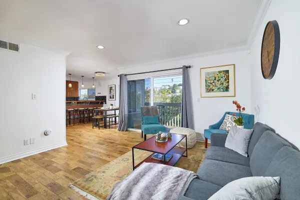a living room with furniture and a table