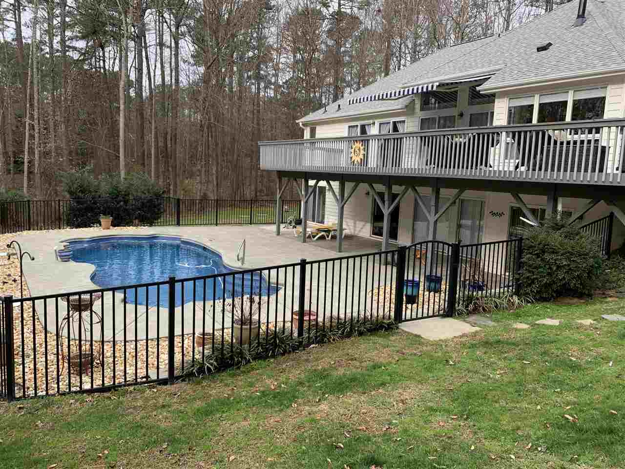 10325 Old Warden Road Raleigh, NC 27615 - Photo 1 of 3 a view of a house with a deck