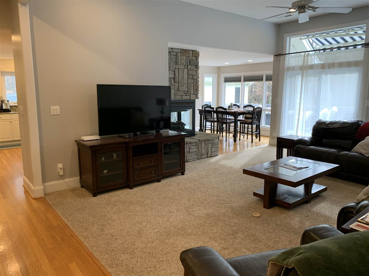 10325 Old Warden Road Raleigh, NC 27615 - Photo 3 of 3 a living room with furniture and a flat screen tv