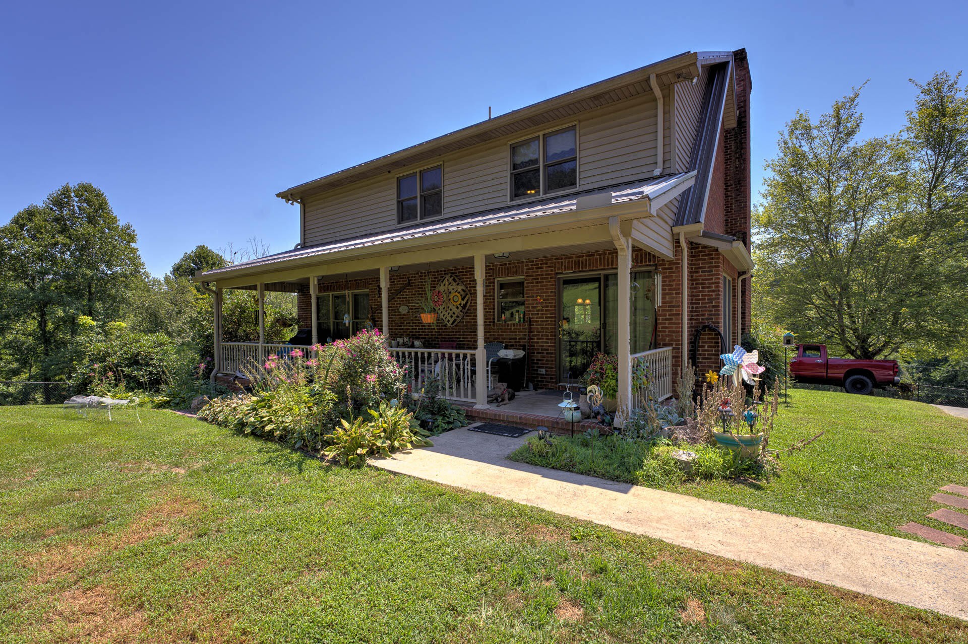 286 Oss Williams Road Limestone, TN 37681 - Photo 6 of 45 front view of a house with a yard