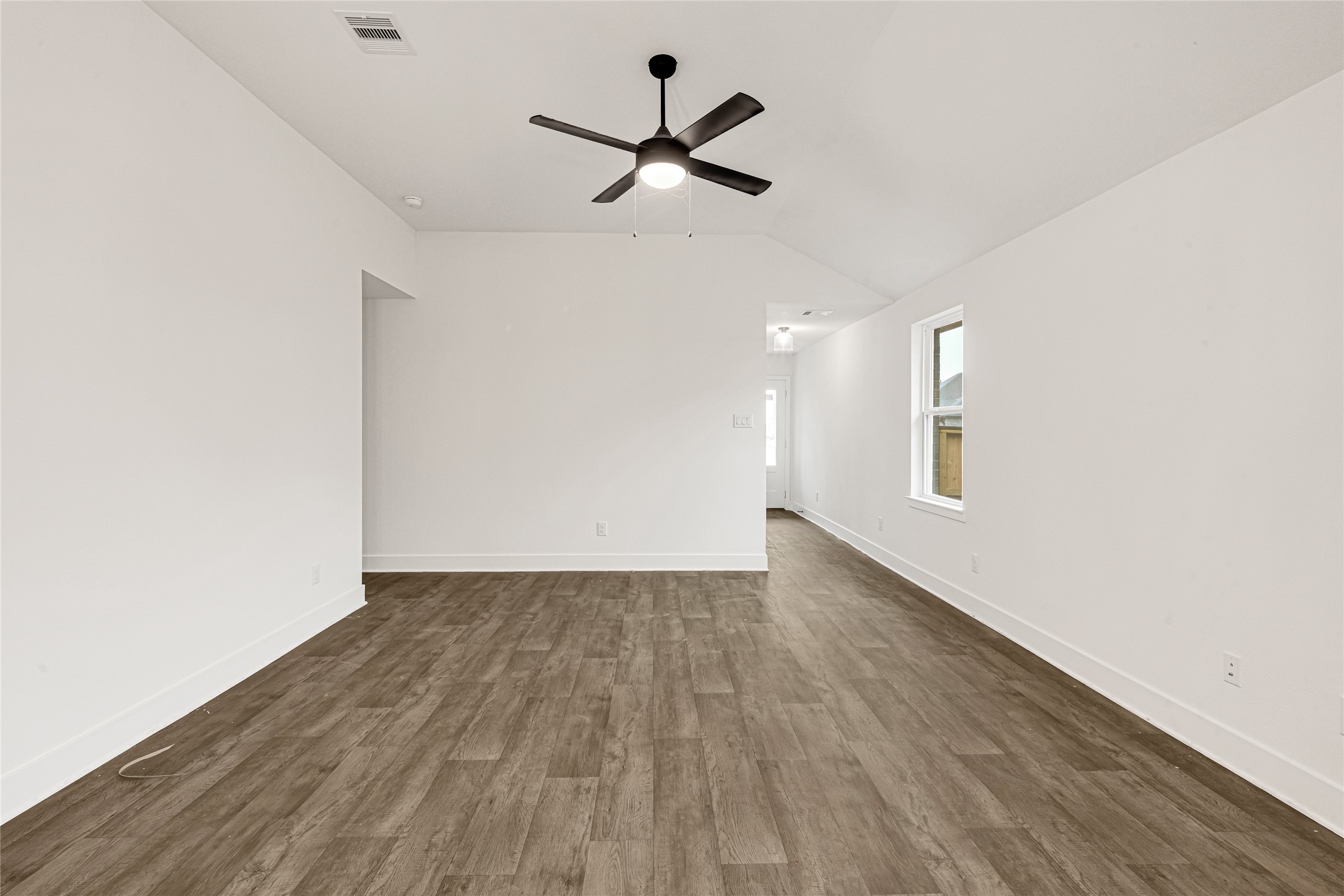 9348 Hard Rock Road Conroe, TX 77303 - Photo 7 of 22 View of Living Area from Dining Area