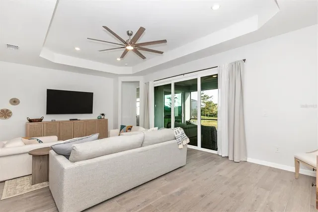 a bathroom with a sink double vanity mirror and a bathtub