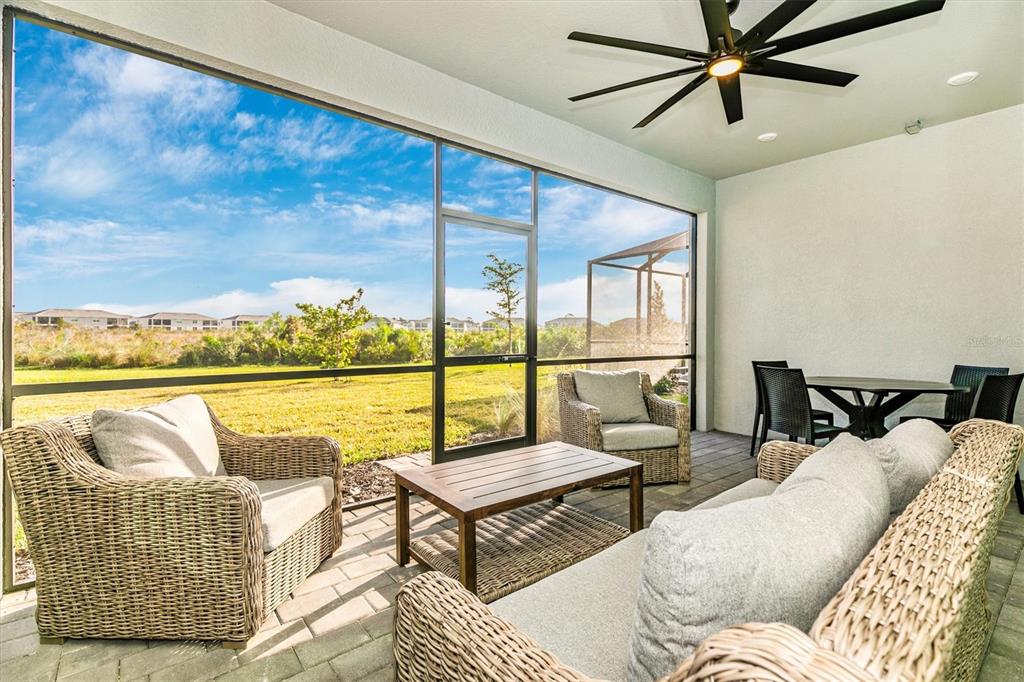 17672 Santorini Court Venice, FL 34293 - Photo 23 of 94 a living room with furniture