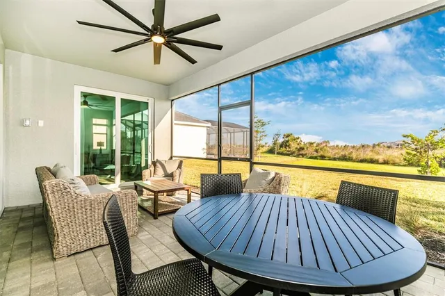 a bedroom with a bed and a lamp