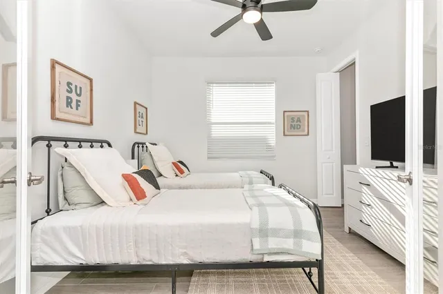 a view of a house with backyard porch and sitting area