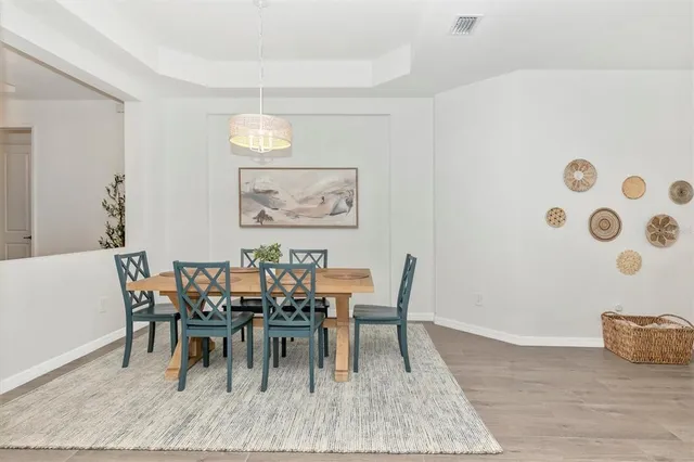 a kitchen with a refrigerator stove and sink