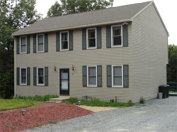 156 Fitchburg Road Townsend, MA 01469 - Photo 1 of 17 a front view of a house with a yard
