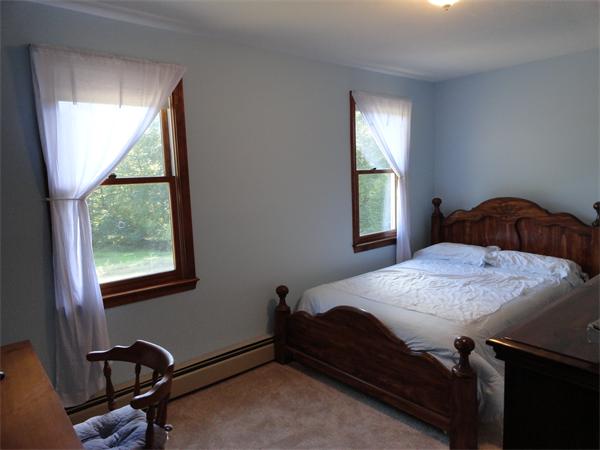 156 Fitchburg Road Townsend, MA 01469 - Photo 11 of 17 a bedroom with a bed and window