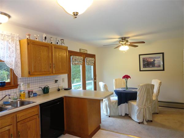 156 Fitchburg Road Townsend, MA 01469 - Photo 4 of 17 a kitchen with a cabinets and appliances