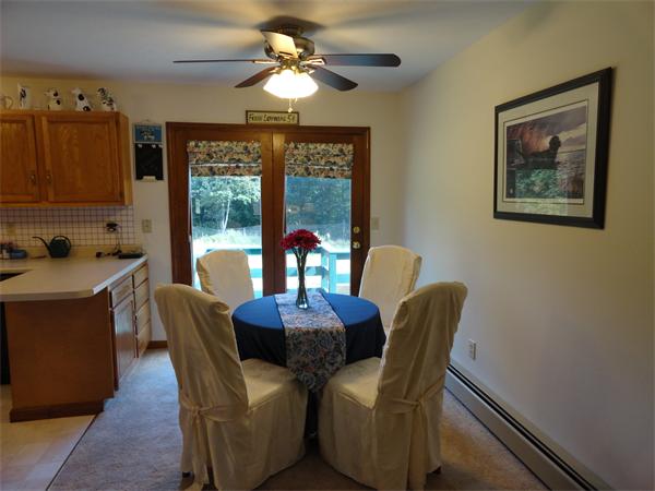 156 Fitchburg Road Townsend, MA 01469 - Photo 6 of 17 a view of a dining room with furniture window and outside view