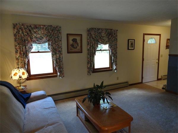 156 Fitchburg Road Townsend, MA 01469 - Photo 7 of 17 a living room with furniture and a window
