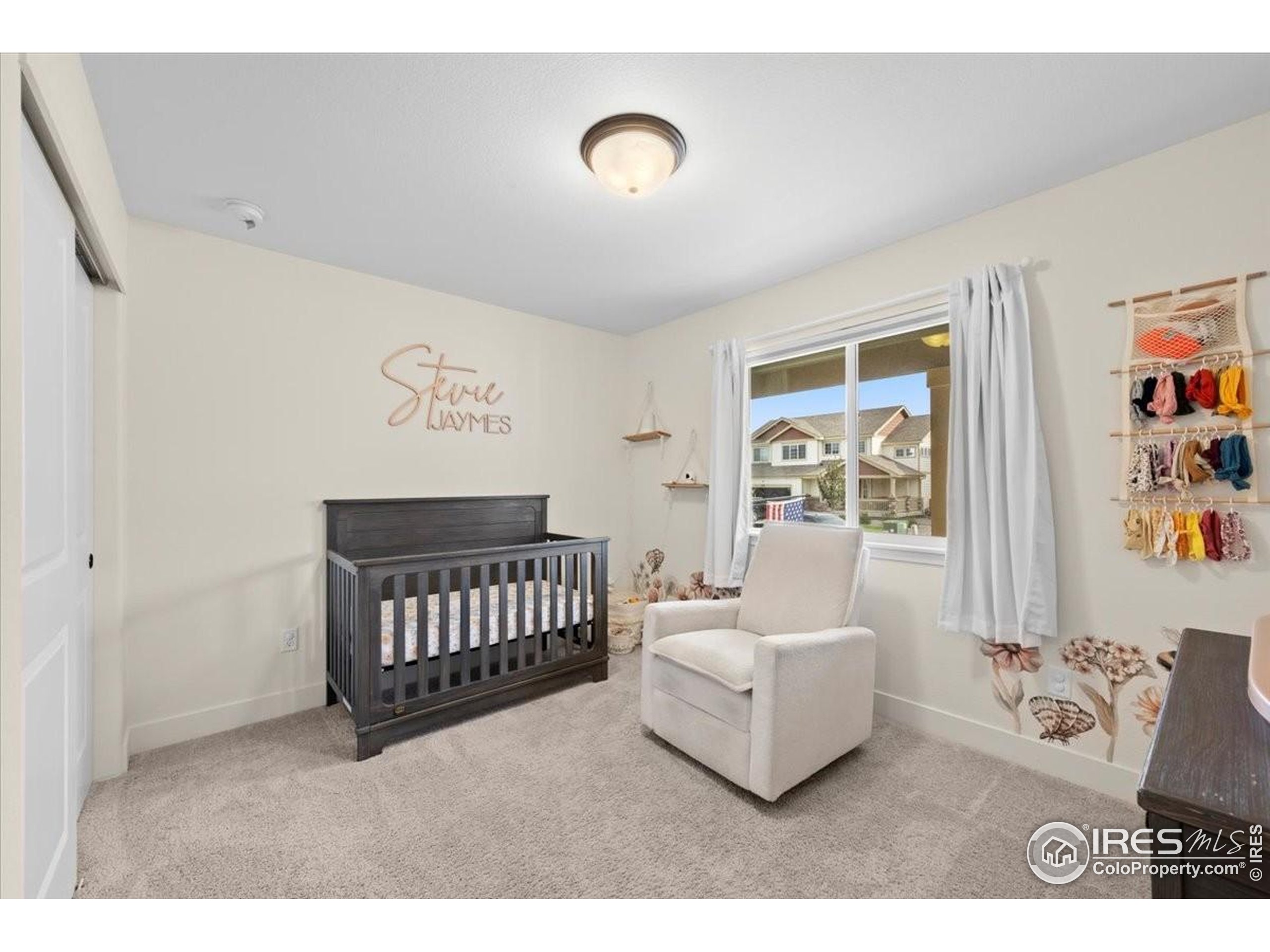 915 Milner Pass Road Severance, CO 80550 - Photo 16 of 20 a bedroom with furniture and a window