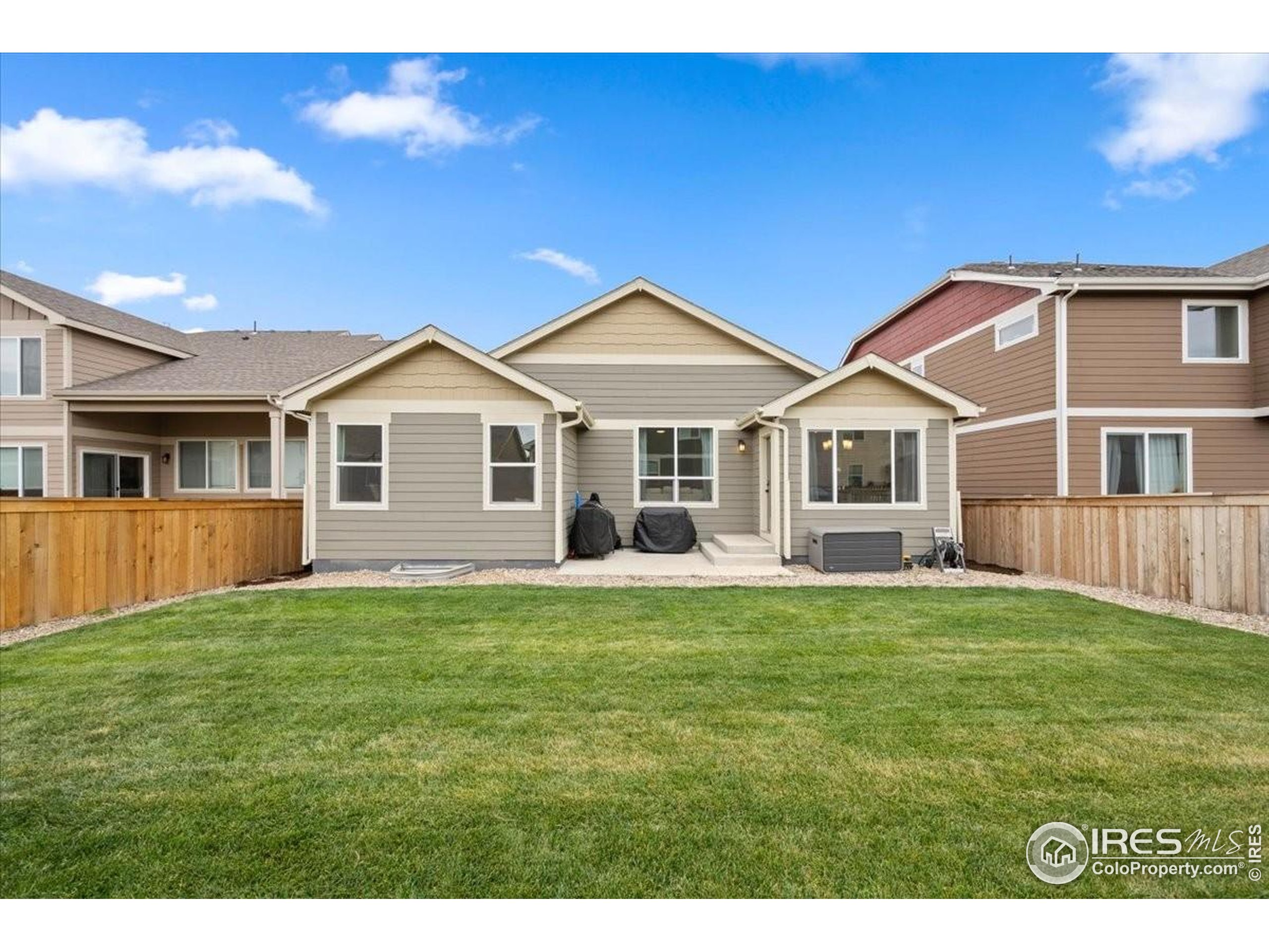915 Milner Pass Road Severance, CO 80550 - Photo 19 of 20 a front view of a house with a garden