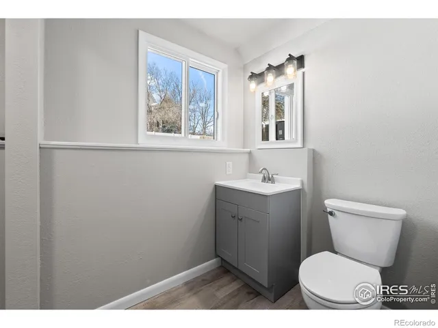 a view of a bathroom with sink and window