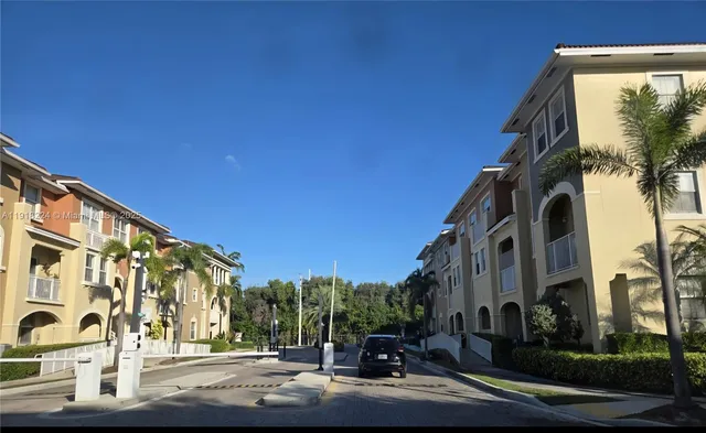 a view of city with tall buildings