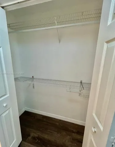 a view of small space with racks on the wall