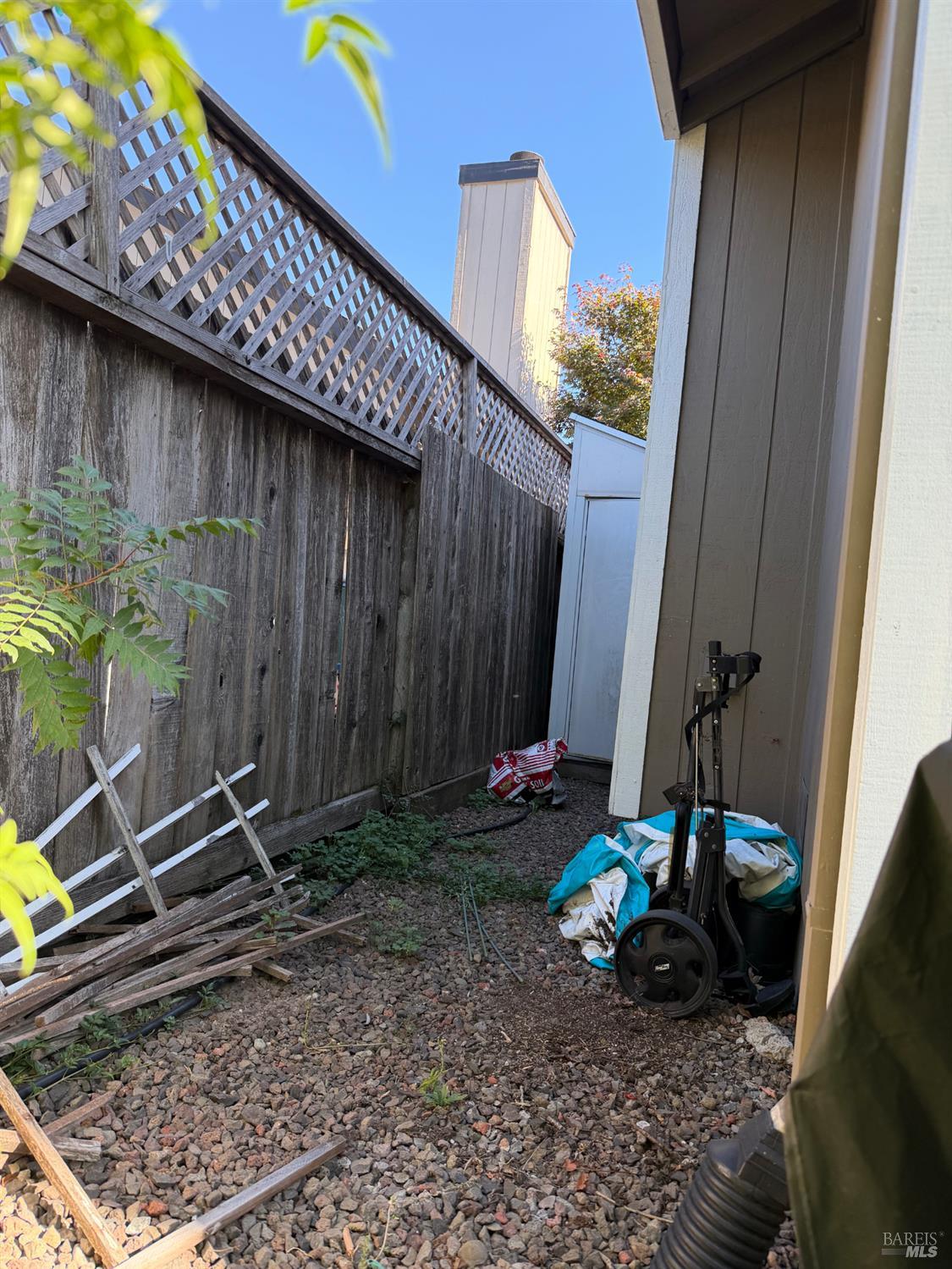 2015 Jackrabbit Court Santa Rosa, CA 95403 - Photo 19 of 20 a view of a backyard with chairs and potted plants