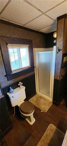 a bedroom with two beds and a window