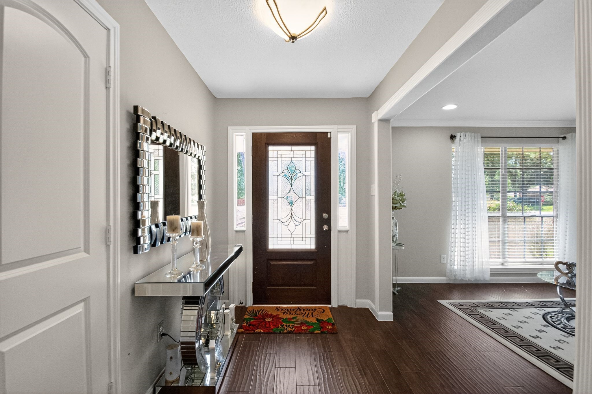 2514 Creekleaf Road Houston, TX 77068 - Photo 2 of 31 Welcoming entry featuring a decorative glass front door and bright foyer with clean, modern lines.