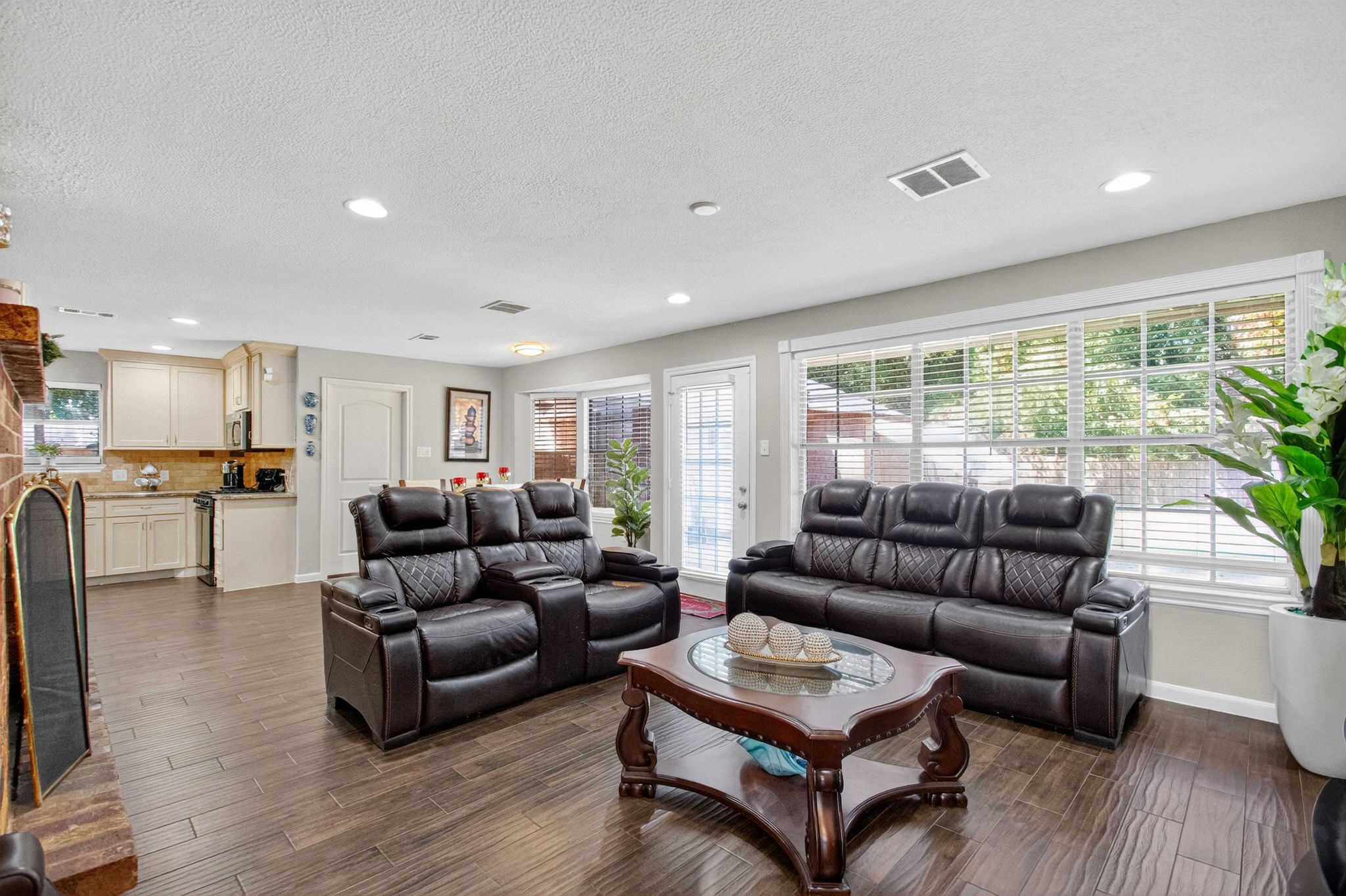 2514 Creekleaf Road Houston, TX 77068 - Photo 6 of 31 Open-concept living area with abundant natural light, and seamless flow into the dining and kitchen spaces.