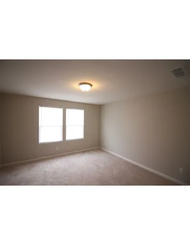 a open living room with a couch