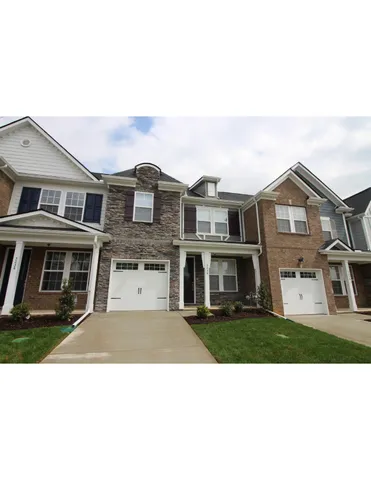 a black and white photo of a house