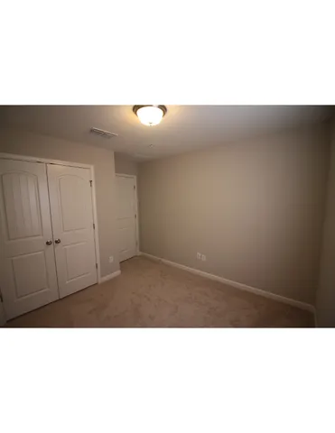 a bathroom with a sink tub shower and a mirror