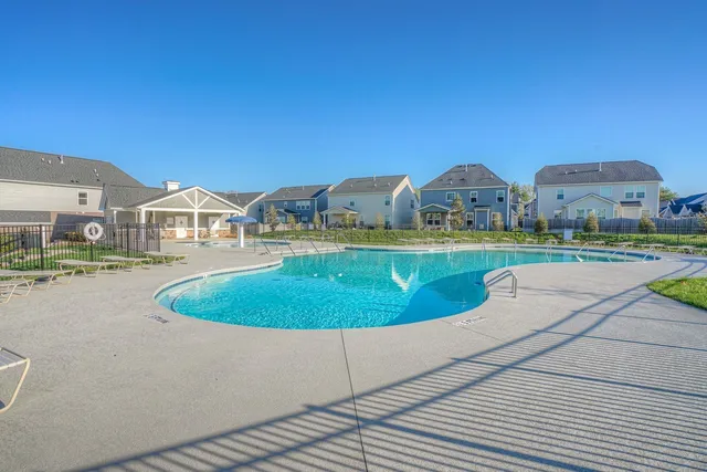 a view of a street with a building in the background