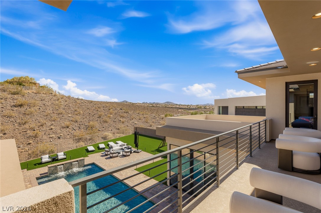5 Crystal Tree Pass Henderson, NV 89052 - Photo 47 of 67 An inviting private pool and patio area, complete with tranquil water features, offers sweeping desert and mountain vistas.