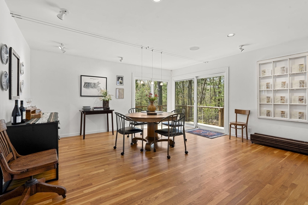 11 Chaplin Road Boxford, MA 01921 - Photo 14 of 42 a view of a dining room with furniture window and wooden floor