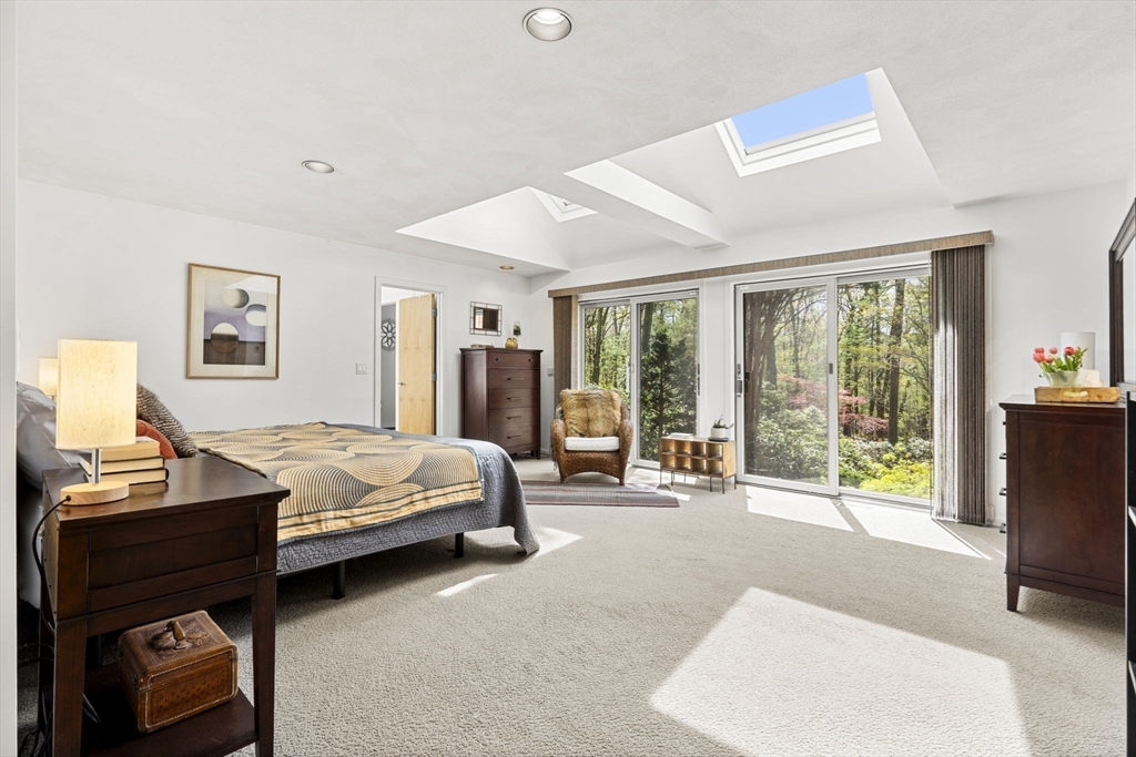 11 Chaplin Road Boxford, MA 01921 - Photo 23 of 42 a bedroom with a bed and large windows