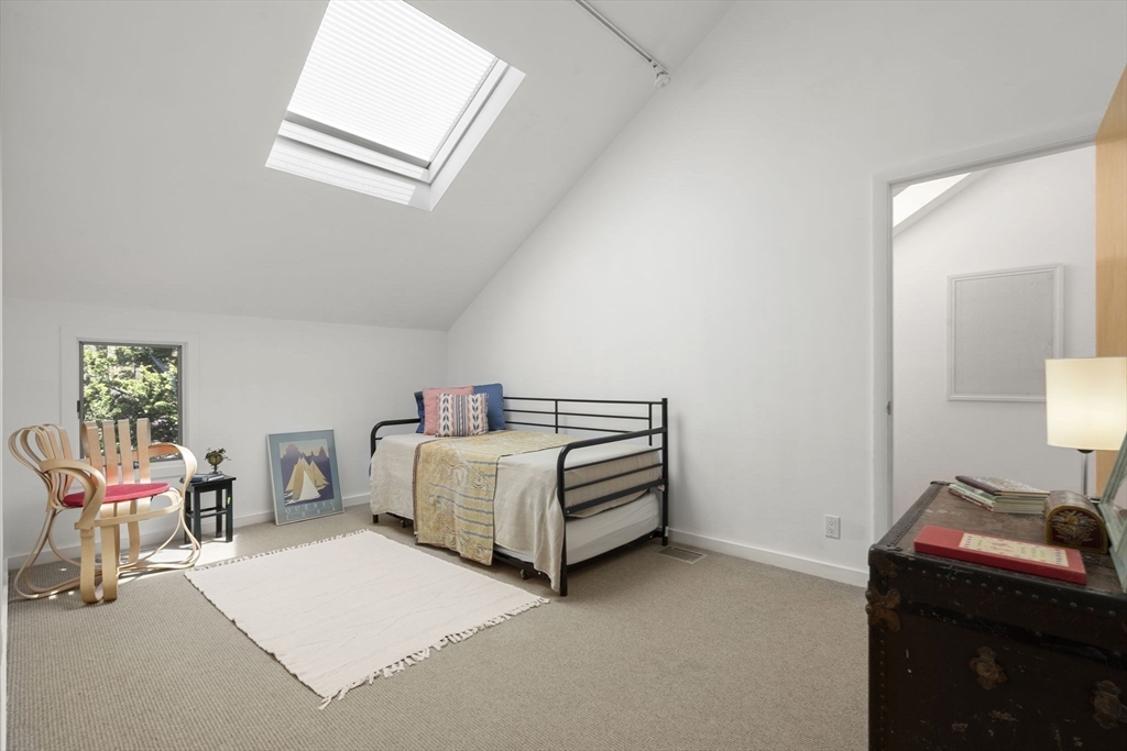 11 Chaplin Road Boxford, MA 01921 - Photo 27 of 42 a bedroom with a bed and a table in it