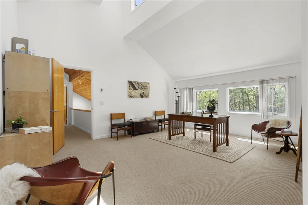 11 Chaplin Road Boxford, MA 01921 - Photo 28 of 42 a living room with furniture and a window