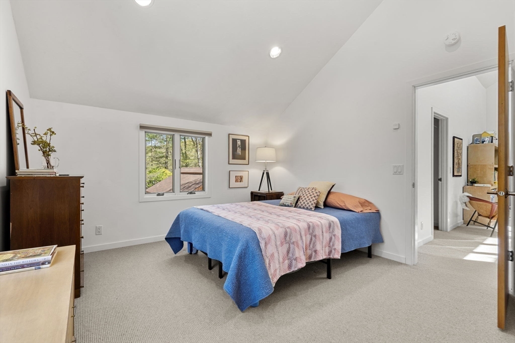 11 Chaplin Road Boxford, MA 01921 - Photo 30 of 42 a spacious bedroom with a bed and a window