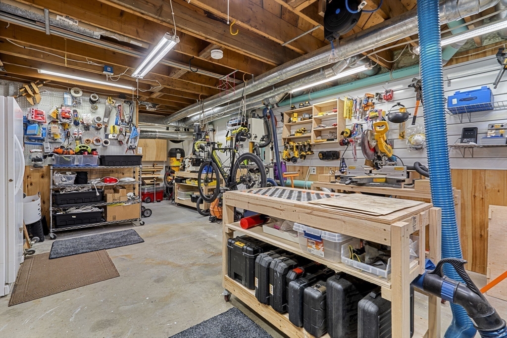 11 Chaplin Road Boxford, MA 01921 - Photo 36 of 42 a utility room with lot of clutter and cabinets