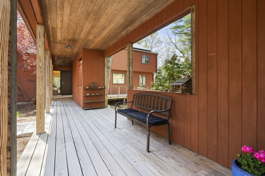 11 Chaplin Road Boxford, MA 01921 - Photo 8 of 42 a view of a chairs and a room with wooden floor and furniture