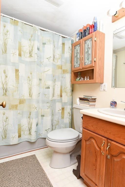 156 Indian Neck Road Wareham, MA 02571 - Photo 13 of 18 a bathroom with a sink toilet and shower