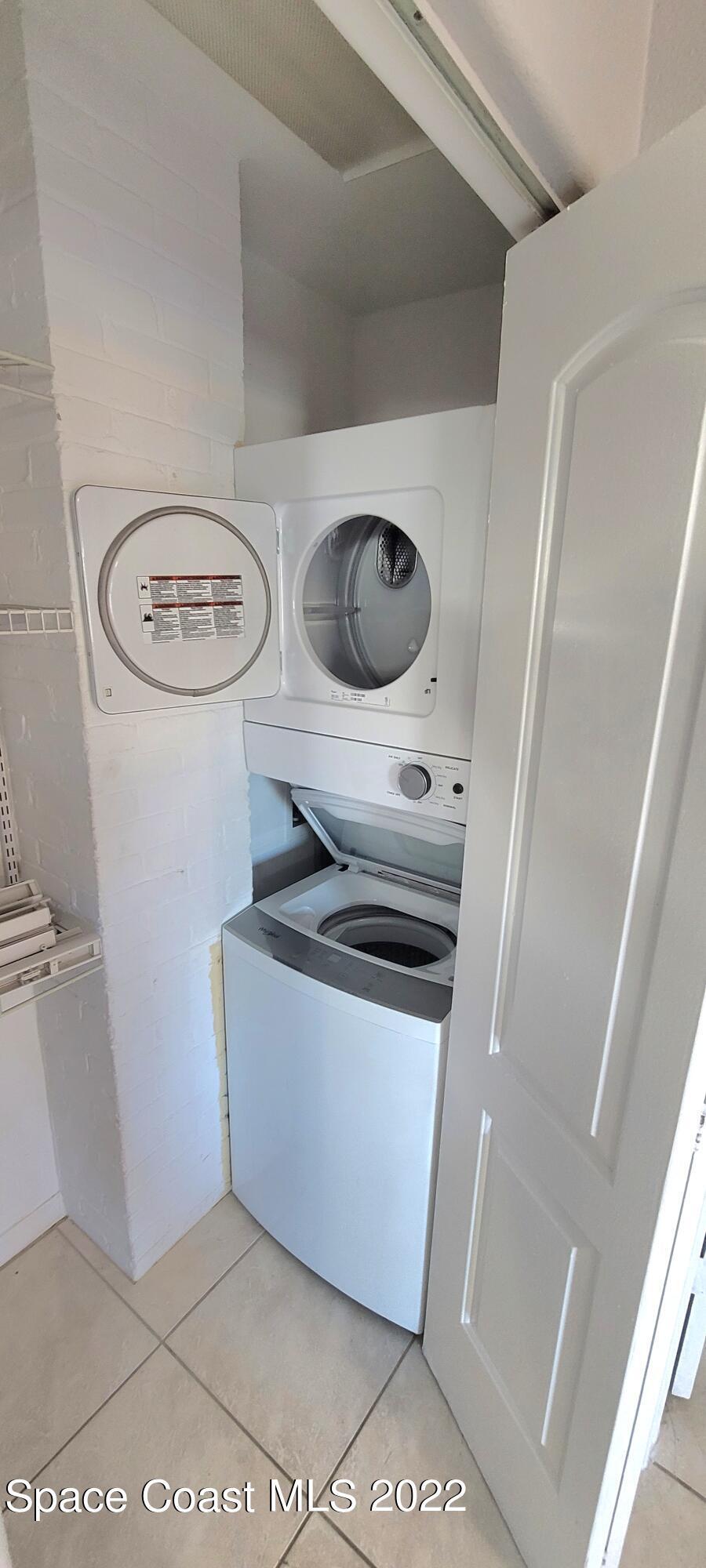 802 Forrest Avenue, Unit A Cocoa, FL 32922 - Photo 13 of 16 a utility room with dryer and washer