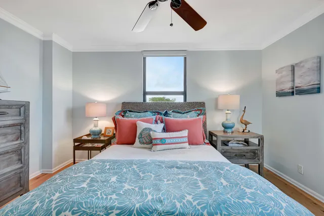 a bedroom with bed and window