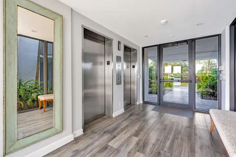 a view of entryway with wooden floor