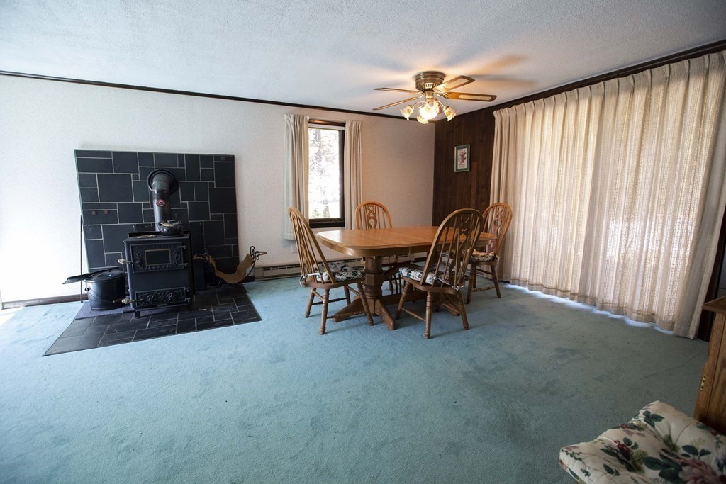 69 Sturges Road Reading, MA 01867 - Photo 17 of 42 a view of a livingroom with furniture and a window