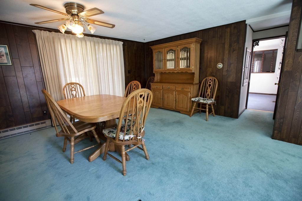 69 Sturges Road Reading, MA 01867 - Photo 19 of 42 a dining room with furniture and window