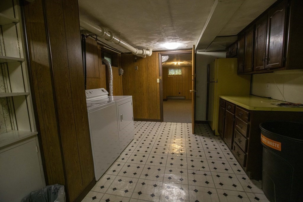 69 Sturges Road Reading, MA 01867 - Photo 24 of 42 a bathroom with a sink and a mirror