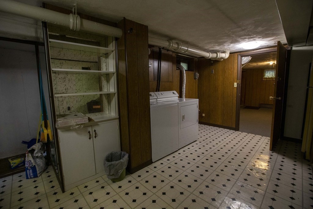 69 Sturges Road Reading, MA 01867 - Photo 25 of 42 a bathroom with a bathtub and a shower