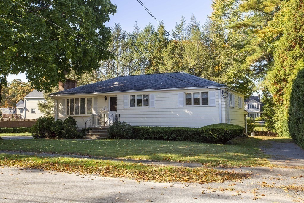 69 Sturges Road Reading, MA 01867 - Photo 38 of 42 a view of a house with a yard