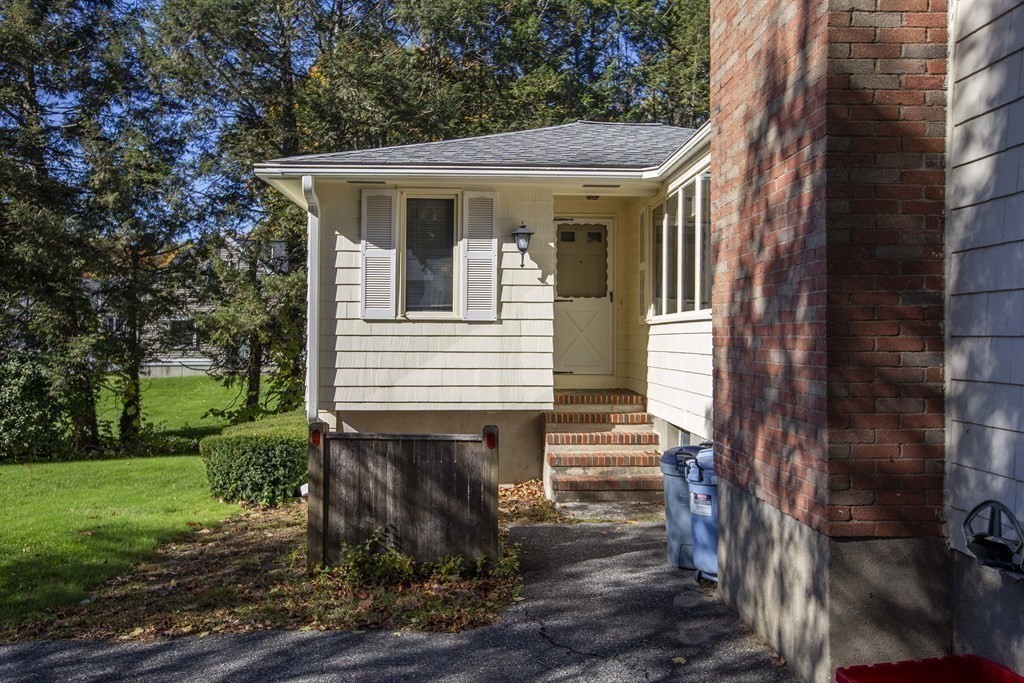 69 Sturges Road Reading, MA 01867 - Photo 42 of 42 a view of a house with a yard