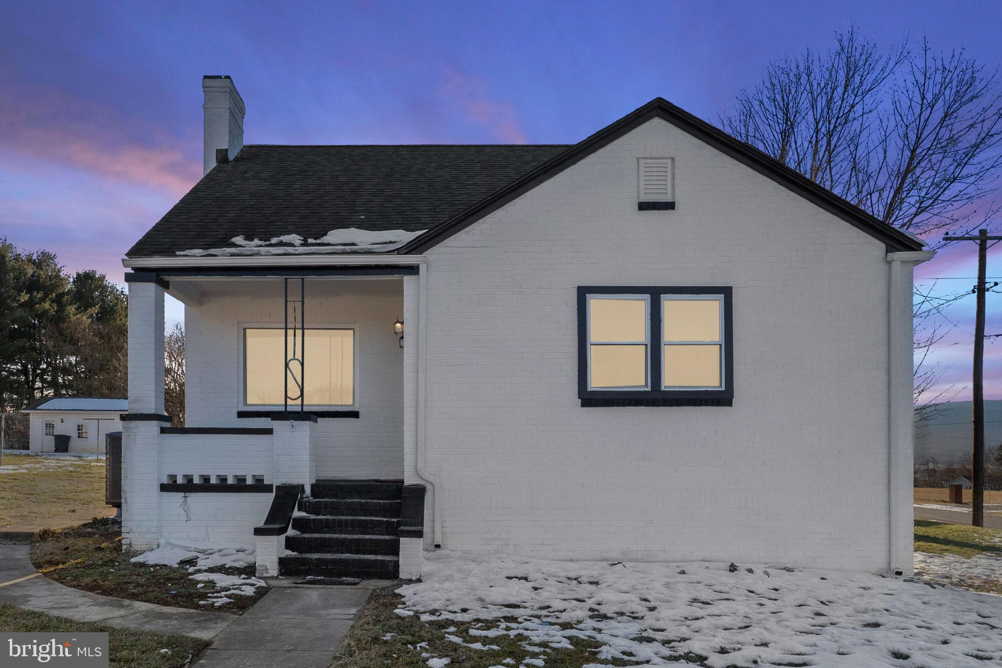 701 South 2nd Street Shenandoah, VA 22849 - Photo 1 of 39 Charming home with a serene twilight backdrop.