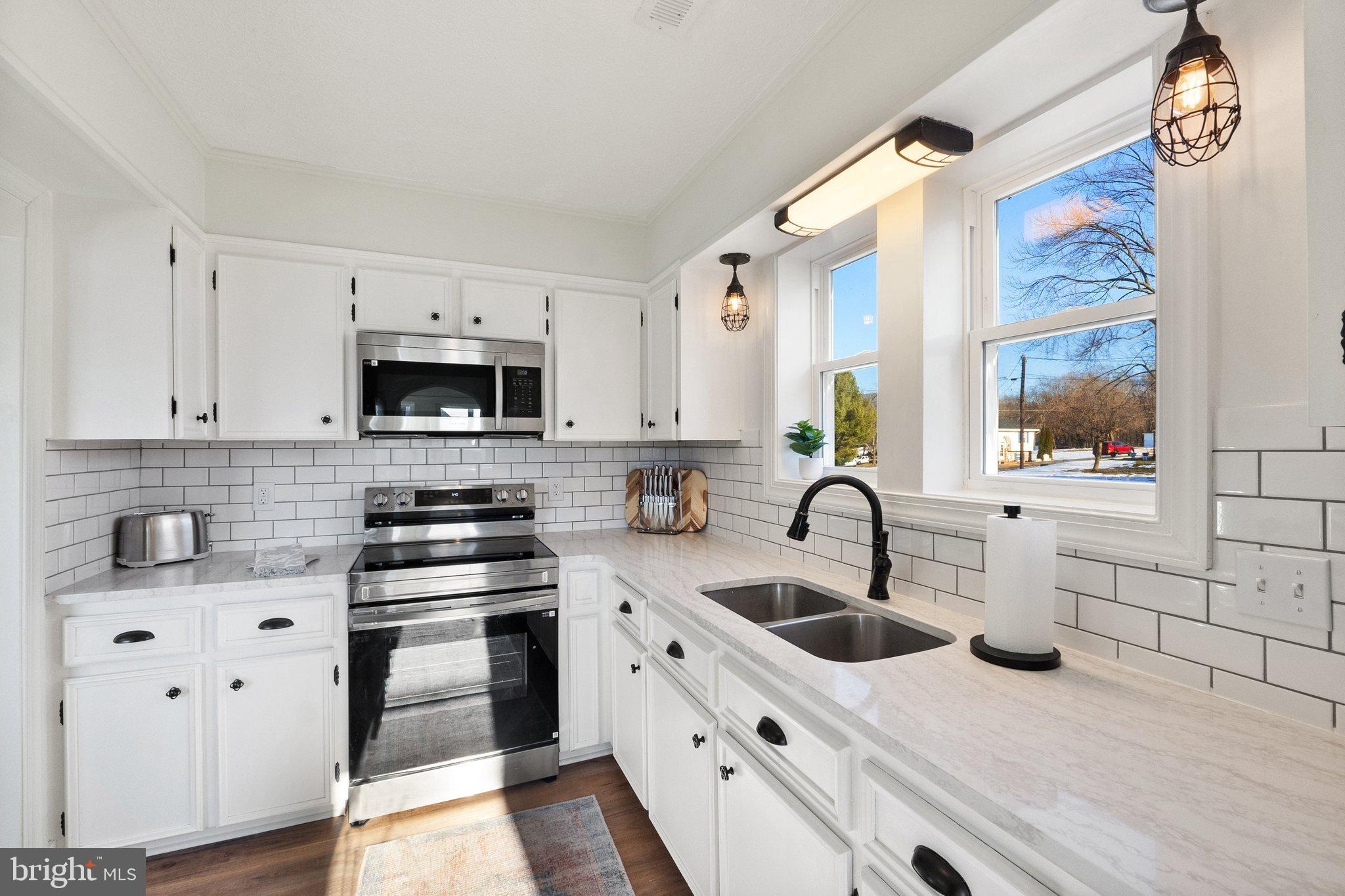 701 South 2nd Street Shenandoah, VA 22849 - Photo 23 of 39 Bright and inviting modern kitchen space.