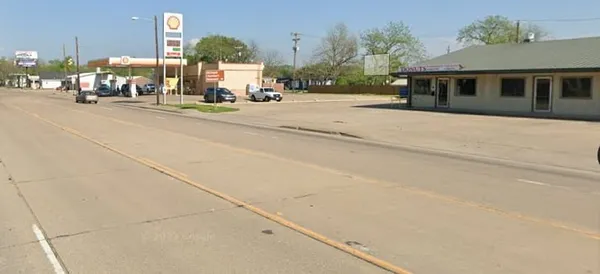 a view of a building with a street